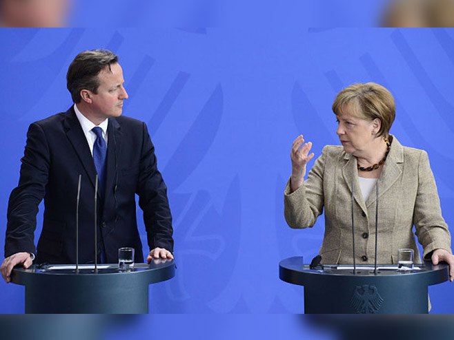 Kameron i Merkel - Foto: The Telegraph