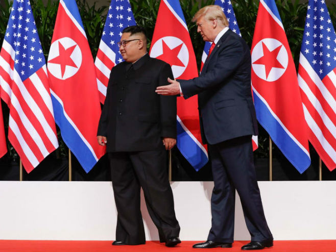 Donald Tramp i Kim DŽong Un - Foto: AP