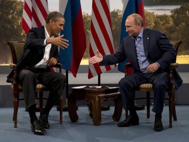 Barak Obama i Vladimir Putin - Foto: AP