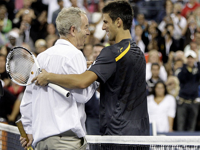 Novak Đoković i Džon Mekinro - Foto: AP