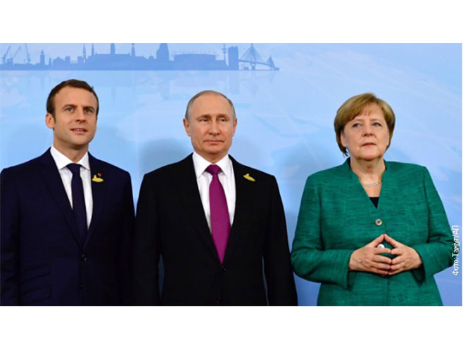 Emanuel Makron, Vladimir Putin i Angela Merkel - Foto: RTS
