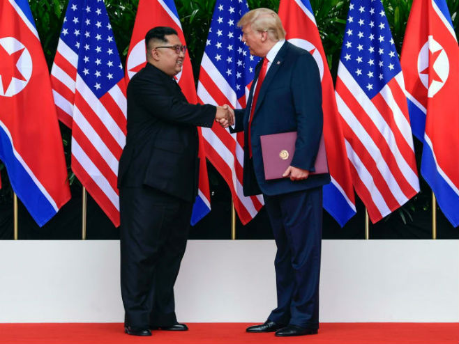 Donald Tramp i Kim DŽong Un, arhiv - Foto: AP