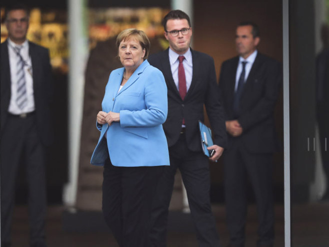 Angela Merkel  (Foto:AP Photo / Markus Schreiber) - 