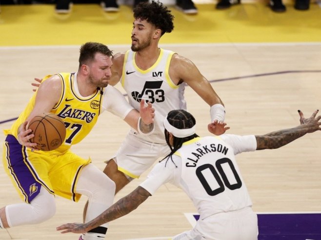 Luka Dončić (Foto: EPA-EFE/CAROLINE BREHMAN) - 