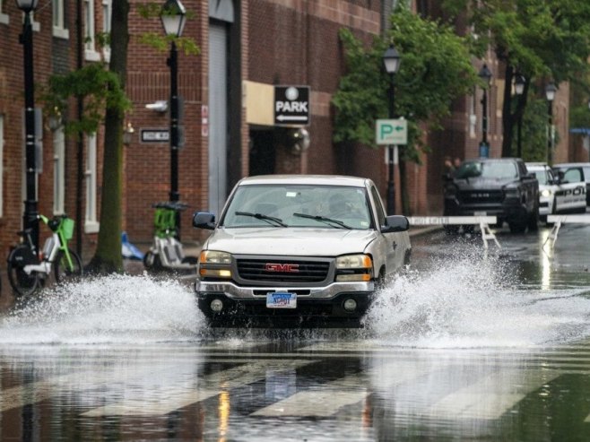 Kiša u Vašingtonu (Foto: ilustracija/EPA/SHAWN THEW) - 