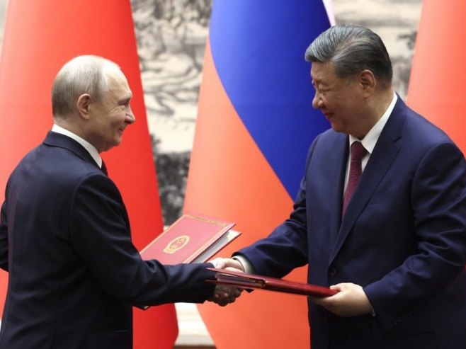 Putin i Si (foto: EPA/Maxim Shemetov) Putin i Si (foto: EPA/Maxim Shemetov) -